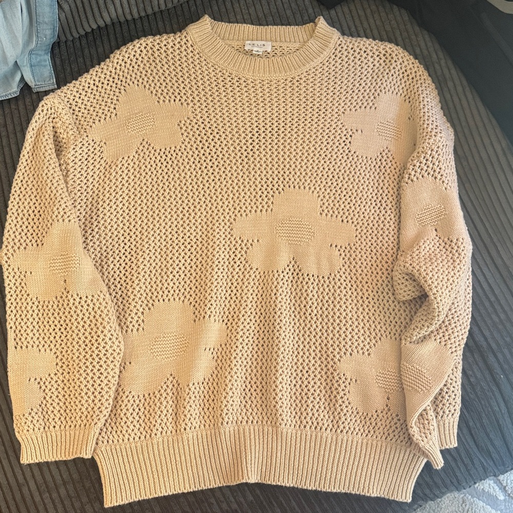 Cream open stich sweater with flower pattern